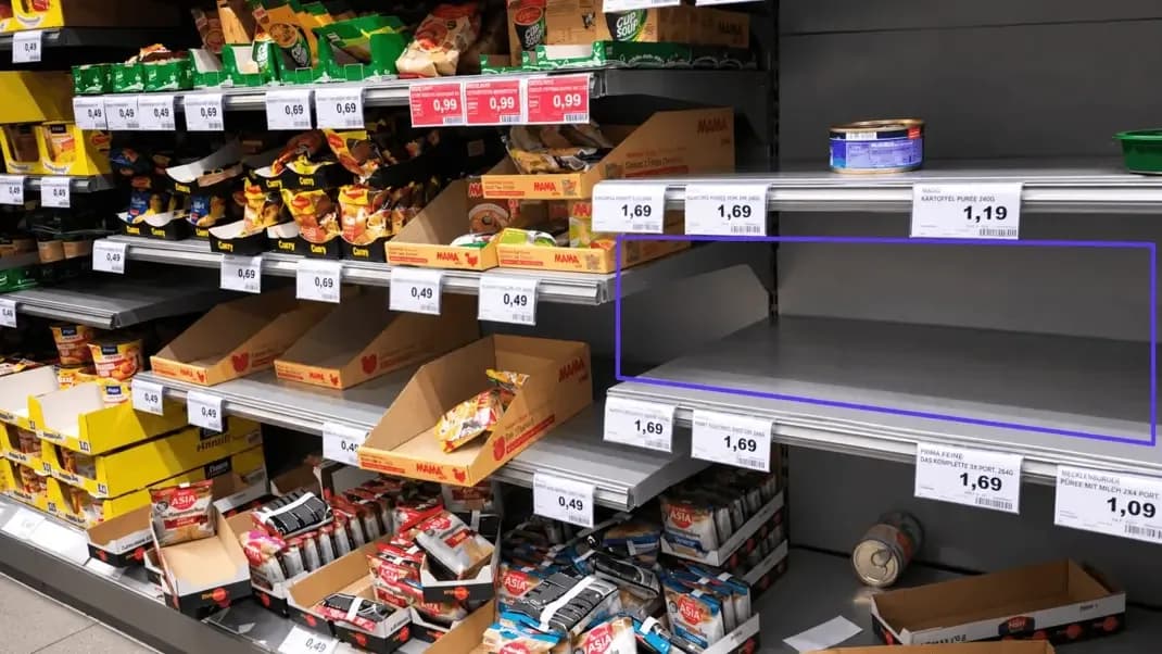 Grocery store shelves with a purple rectangle highlighting an empty section beside packaged products and price labels.